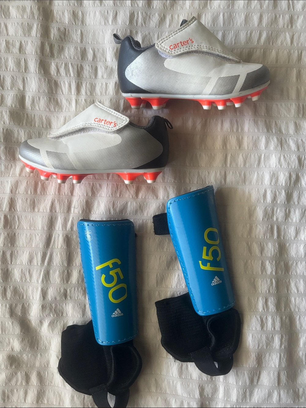 Toddler Kids Soccer Cleats in White and Gray with Blue Adidas Shinguards - Picture 7 of 10
